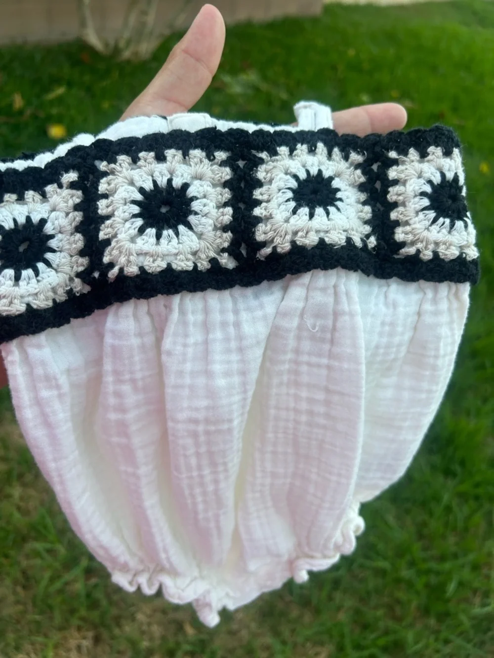 Old Navy White Baby Romper with Black and Cream Crochet Trim